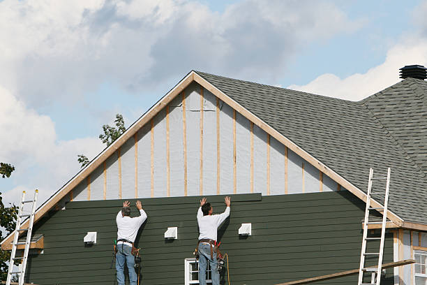 Professional Siding technician working in Amston, CT